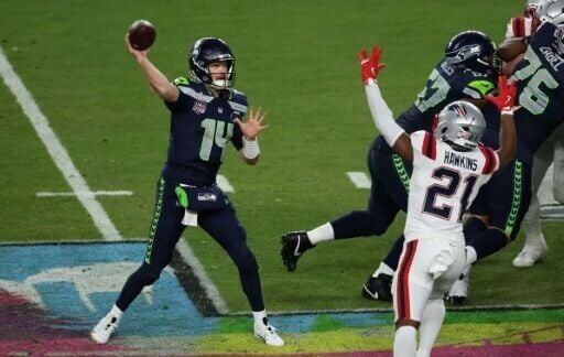 Sam Darnold's throws a pass in Seattle's Super Bowl victory over New England