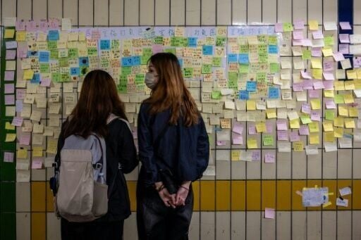 Near the wrecked towers, the wall of a subway tunnel was covered with colourful notes bearing heartfelt messages