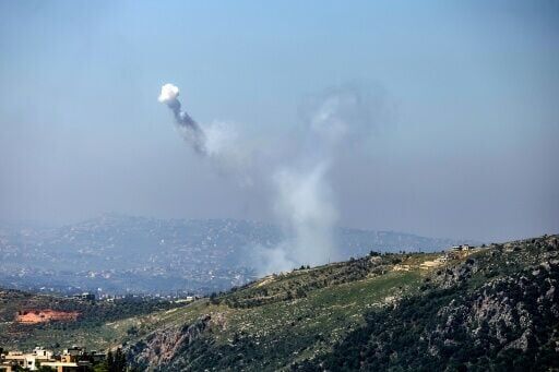 Smoke from Israeli shelling on the village of Yohmor, seen from the southern Lebanese area of Marjeyoun