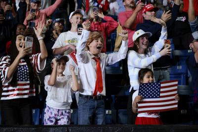 Audience members cheer as President Donald Trump delivers remarks during a campaign rally at Crossroads Arena on Oct. 26, 2026, in Corinth, Miss.