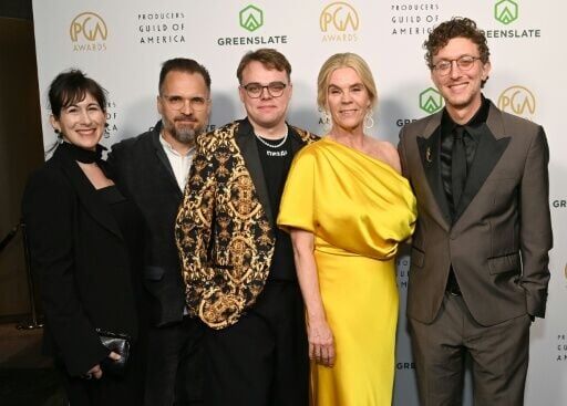 Pavel Talankin (centre) will walk into Hollywood's biggest night as the co-director of an Oscar-nominated documentary