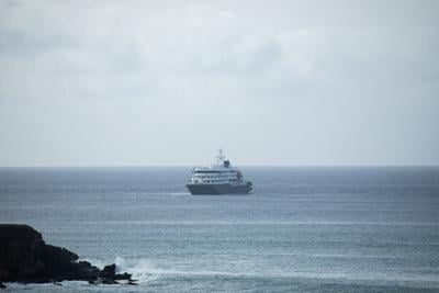 The cruise ship MV Hondius sits anchored off Praia, the capital of Cape Verde, on May 5, 2026, before setting course for Spain on May 6.
