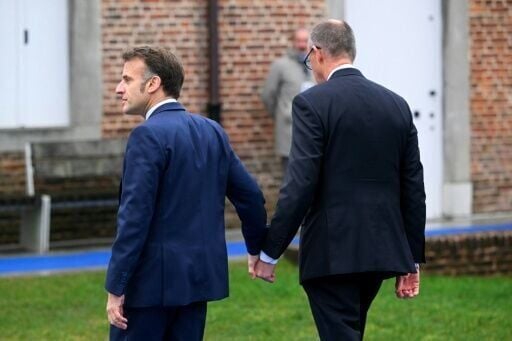 French President Emmanuel Macron and German Chancellor Friedrich Merz sought to downplay their differences before EU leaders' talks on Thursday