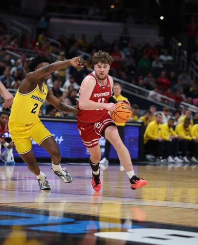 No. 22 Michigan forges comeback vs. No. 18 Wisconsin for Big Ten tourney title