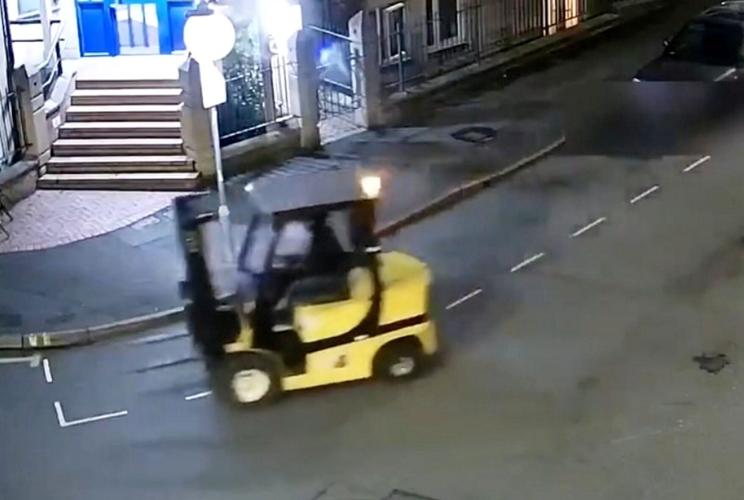 Drunk man takes and drives forklift down street – with whiskey bottle in hand