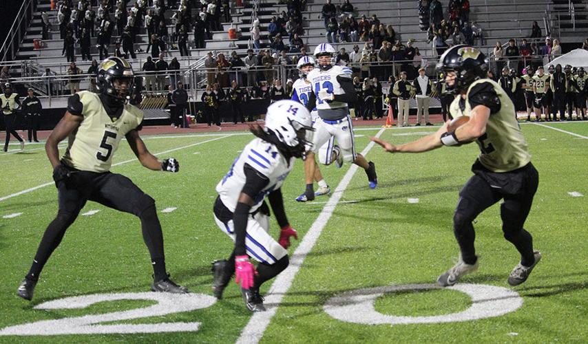 Wetumpka stiff arms.jpg