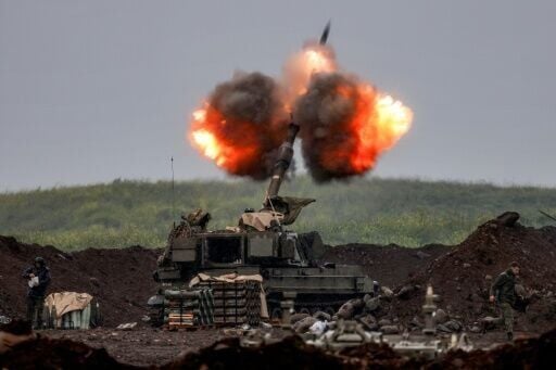 An Israeli howitzer fires rounds towards southern Lebanon from a position in the upper Galilee in northern Israel near the border on March 20, 2026