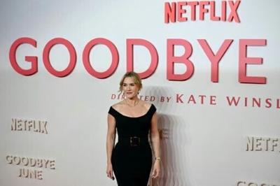 British actress Kate Winslet poses on the red carpet at the world premiere of the film "Goodbye June", her directorial debut