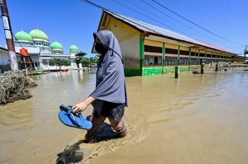 A tropical storm has exacerbated the heavy rain that Indonesia and Thailand normally witness during the monsoon season