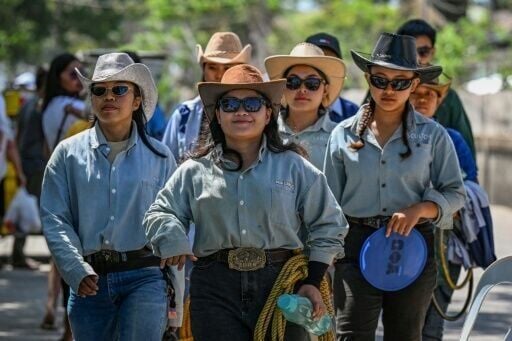 Women arriving to compete during the Rodeo Festival in the province of Masbate