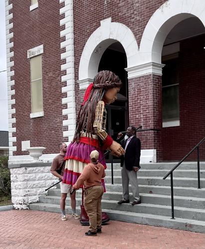Little Amal puppet wows Selma as crowd gathers to follow her through downtown, photo gallery