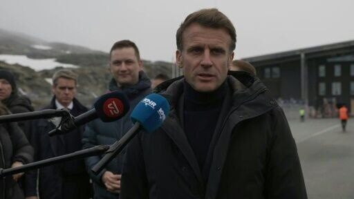 Macron, on Greenland visit, berates Trump for threats against the territory