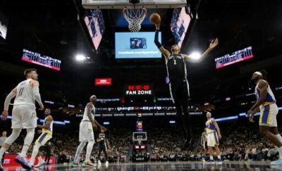 San Antonio Spurs star Victor Wembanyama throws down a dunk in an NBA game against the Indiana Pacers