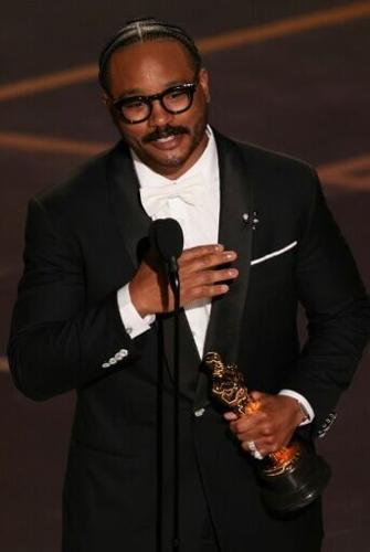 Ryan Coogler accepts the award for Best Writing (Original Screenplay) for "Sinners" at the 98th annual Oscars