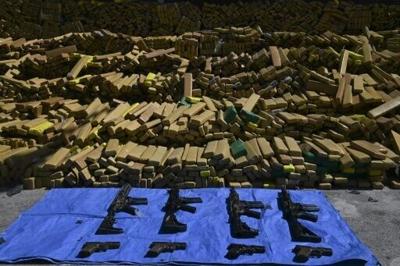 View of 48 tons of seized marijuana and weapons presented in Rio de Janeiro, Brazil