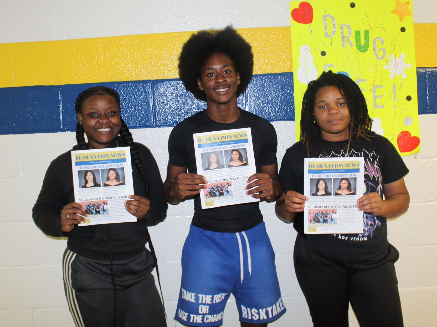 Students with paper.JPG