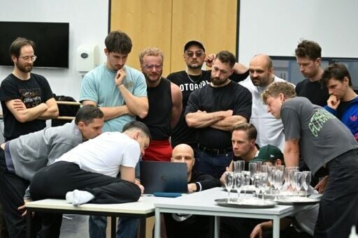 Russian director Kirill Serebrennikov (back C) is pictured with members of the production during a dress rehearsal