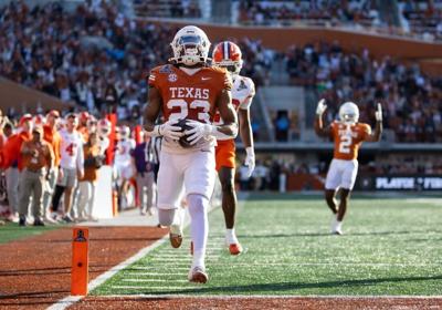 No. 5 Texas runs away from No. 12 Clemson, off to CFP quarterfinals