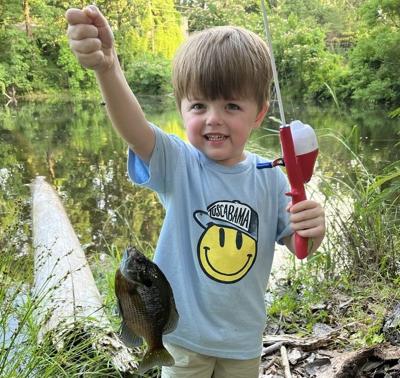 Kid with fish