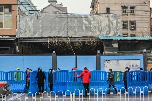 China says shared Covid information 'without holding anything back'