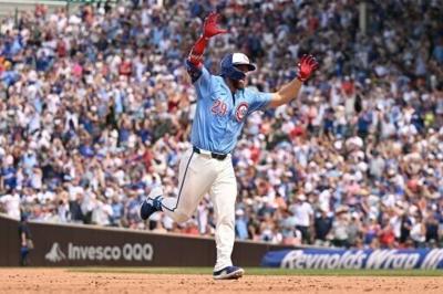 MLB Cubs smash team-record eight homers to crush Cardinals