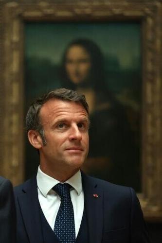 Macron pledges Louvre 'renaissance' after decay alarm