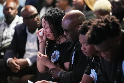 The family of Nolan Wells, during a July 20, 2026, service in Ocean Springs, Miss., for the 18-year-old found dead after taking a July 4 boat trip with friends.