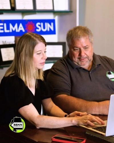 Cindy and Todd in newsroom