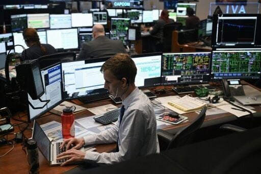 Artemis II flight controllers monitor the Orion spacecraft from the White Flight Control Room at Johnson Space Center in Houston, Texas, on April 6, 2026