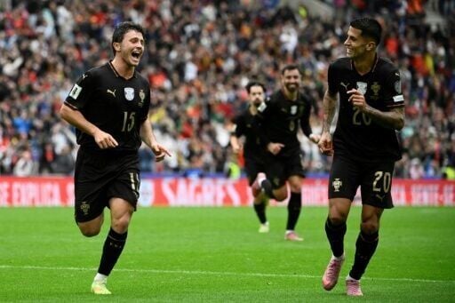 In the absence of the suspended Cristiano Ronaldo, Bruno Fernandes and Joao Neves (L) both scored hat-tricks as Portugal ran riot against Armenia