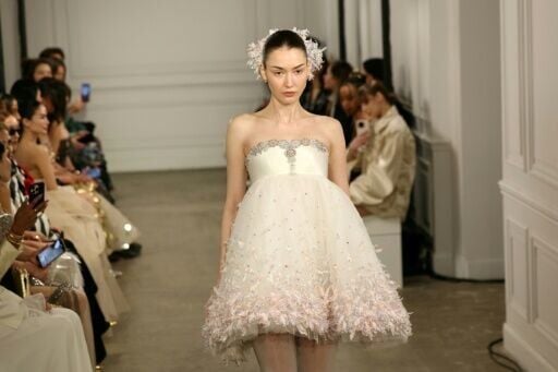 Designer Phan Huy's light muslin and tulle fabric dazzled a celebrity audience in Paris