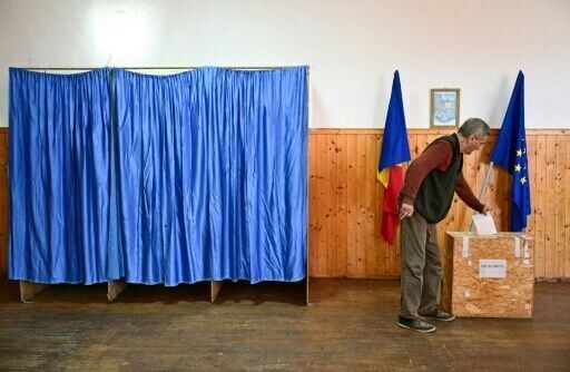 Pro-EU centrist wins tense Romania presidential vote rerun