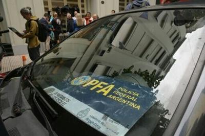 Argentine police carry out simultaneous raids on dozens of football clubs in a graft probe