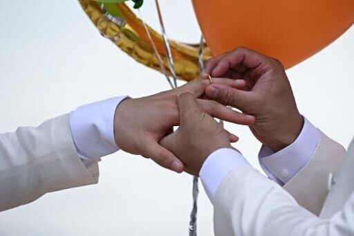 Gay Chinese couple fulfil wedding dream in 'freer' Thailand