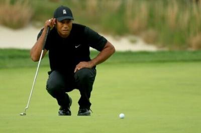 Tiger Woods says it is too soon to start planning his comeback as he recovers from a seventh operation on his back