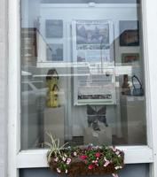 Black Belt Treasures displays work by local artists in window at Selma Sun's downtown office