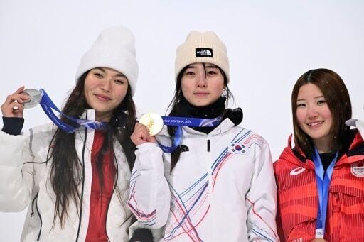 Chloe Kim (L) was relegated to silver medal position in the Olympic halfpipe by South Korea's Choi Gaon (C) while Japan's Mitsuki Ono took bronze