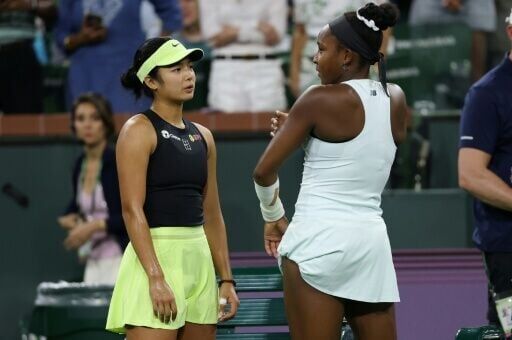 American Coco Gauff talks to Alexandra Eala of the Phiippines after retiring from their third-round match at Indian Wells with a left arm injury