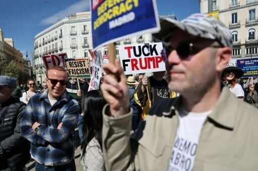 A US national day of protest against President Donald Trump has spilled over to several cities in Europe including Madrid