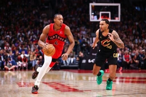 Toronto's Scottie Barnes drives against Jaylon Tyson in the Raptors' NBA playoff win over the Cleveland Cavaliers