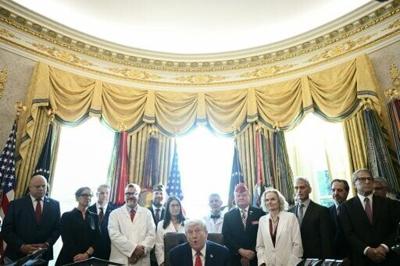 US President Donald Trump speaks before signing an executive order easing restrictions on marijuana in the Oval Office