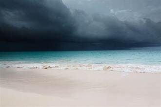 Hurricane near beach stock