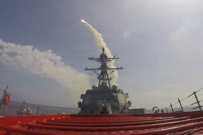 The guided-missile destroyer USS Frank E. Petersen Jr. fires a Tomahawk missile during Operation Epic Fury on Feb. 28, 2026.