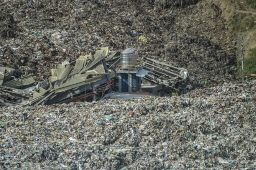 An aerial view of the aftermath of a trash landslide at the landfill in in Cebu City that buried dozens of workers