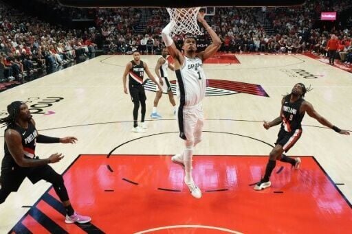 San Antonio's Victor Wembanyama throws down a dunk in the Spurs victory over the Portland Trail Blazers in game four of their NBA playoff series