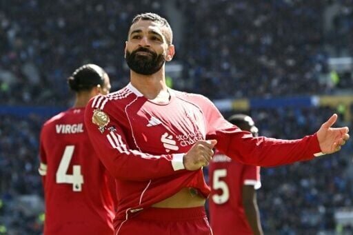 Liverpool forward Mohamed Salah celebrates his goal against Everton