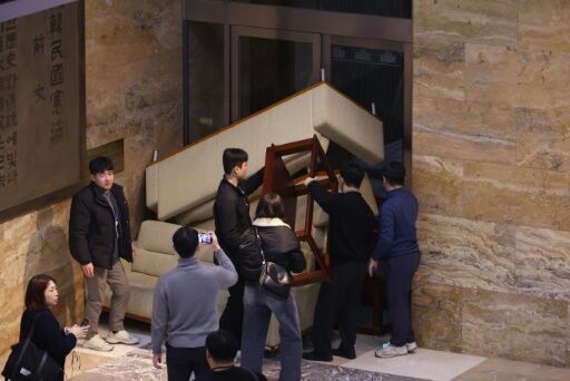 Soldiers vs office chairs: South Korea's martial law standoff