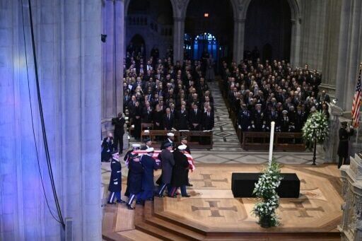 Jimmy Carter briefly unites US as presidents attend funeral