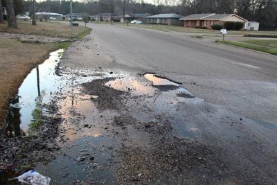 City ponders how to patch plethora of potholes