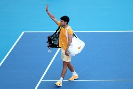 Early exit: World number one Carlos Alcaraz waves to fans after falling to 36th-ranked Sebastian Korda in the third round of the Miami Open